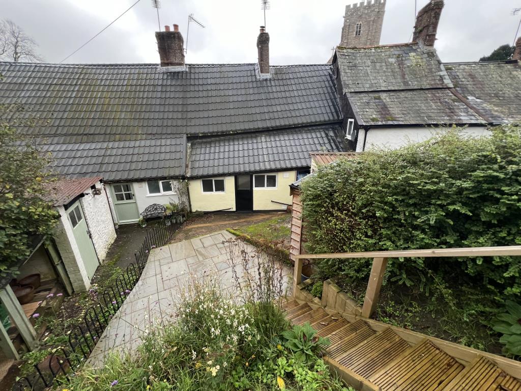 Lot: 96 - CHARACTER COTTAGE IN VILLAGE LOCATION - View from decking looking to patio area